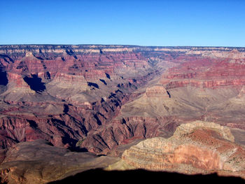 Scenic view of dramatic landscape against clear sky