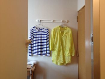 Clothes hanging on table at home