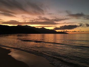 Scenic view of sea against sky during sunset