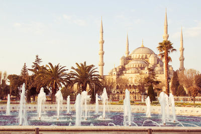 View of fountain against building