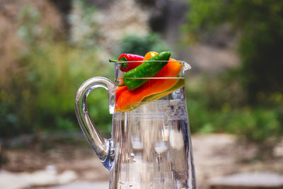 Close-up of fruits on glass