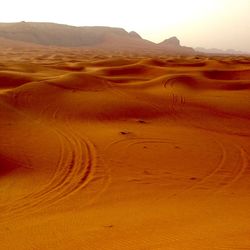 Scenic view of desert against sky