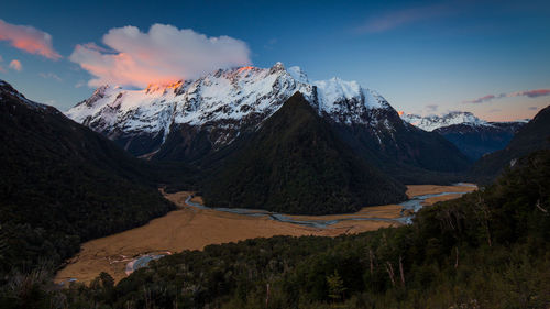 Panoramic view of landscape against sky at sunset