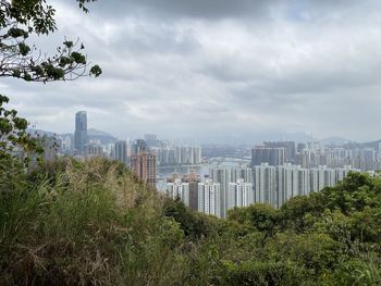 Modern buildings in city against sky