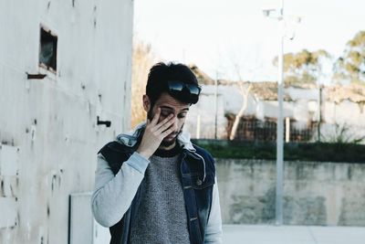 Full length of young man photographing