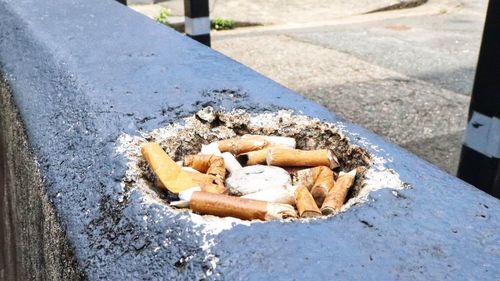 High angle view of cigarette smoking on table