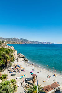 High angle view of beach against clear blue sky