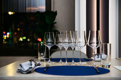 The table in the restaurant served according to the rules of etiquette. evening lights, interior