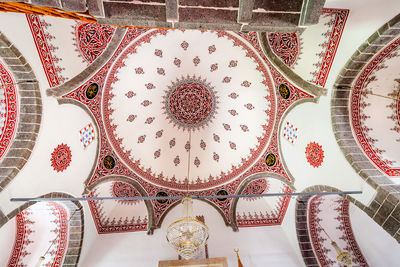 Directly below shot of ornate ceiling