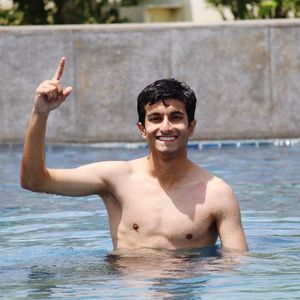 Portrait of young man in swimming pool