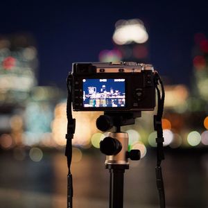 Close-up of a camera against blurred background