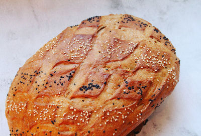 High angle view of bread on table against white background