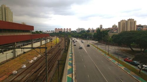 City street against cloudy sky