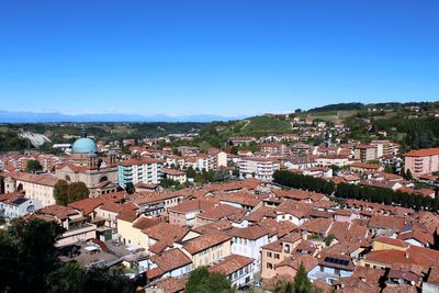 High angle view of townscape against clear blue sky. dogliani, piedmont
