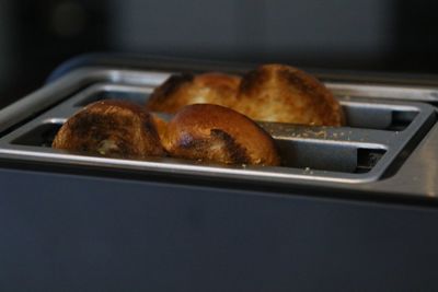 Close-up of toast bread in toaster