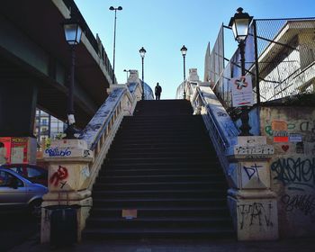 Low angle view of man standing on steps