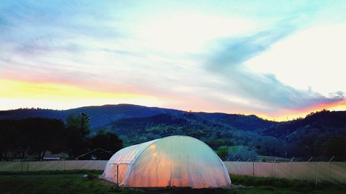 Tent on mountain against sky