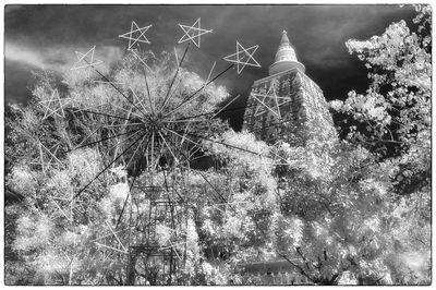 Low angle view of christmas tree against sky