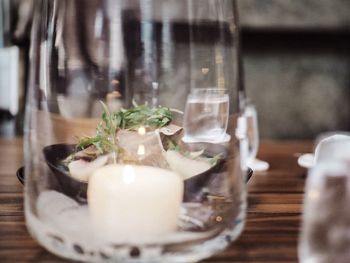 Close-up of drink in glass jar on table