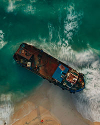 High angle view of abandoned boat in sea