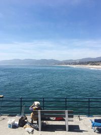 Scenic view of sea against blue sky
