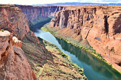 High angle view of river amidst rock formations