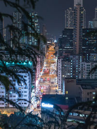 High angle view of illuminated buildings at night