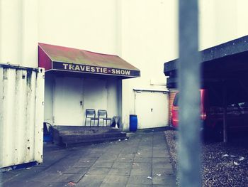 Empty alley along buildings