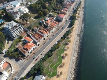 High angle view of residential district by sea