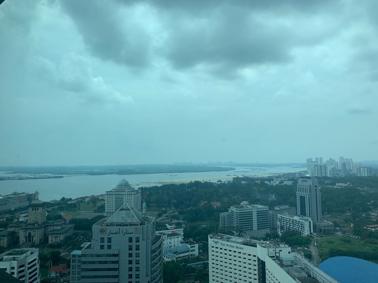 HIGH ANGLE VIEW OF BUILDINGS AND CITY AGAINST SKY