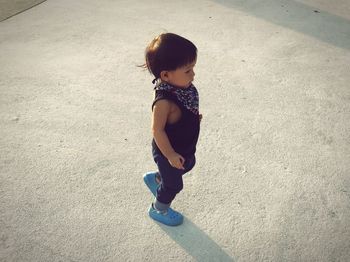 High angle view of boy looking down