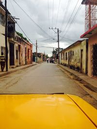 Road in city against sky