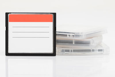 Close-up of laptop on table against white background