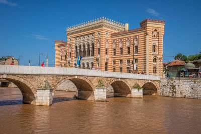 Arch bridge over river