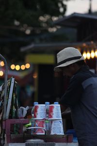 Man preparing food for sale at market stall