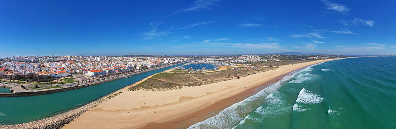 High angle view of beach against blue sky