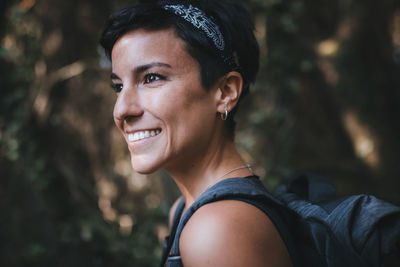 Portrait of smiling woman outdoors