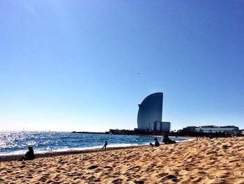 View of beach with buildings in background