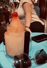 Close-up of sunglasses on table