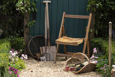 Potted plants in basket on table at yard