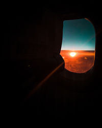 Sunset seen through airplane window