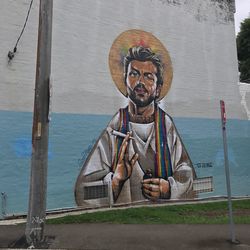 Portrait of man standing against sea