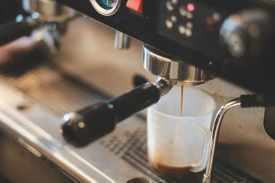 Close-up of coffee cup on table in cafe