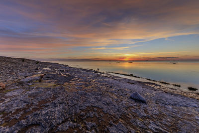 Scenic view of sea against sky during sunset