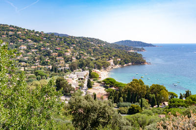 High angle view of townscape by sea