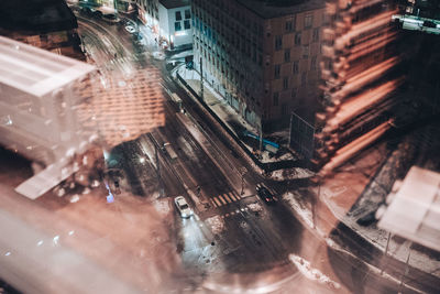 High angle view of illuminated cityscape at night