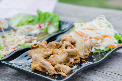 Close-up of served food in plate