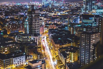 Illuminated cityscape at night