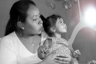 Mother and daughter at home