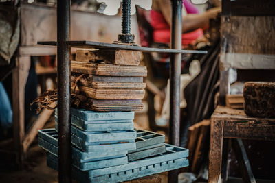 Stack of old for sale at market stall